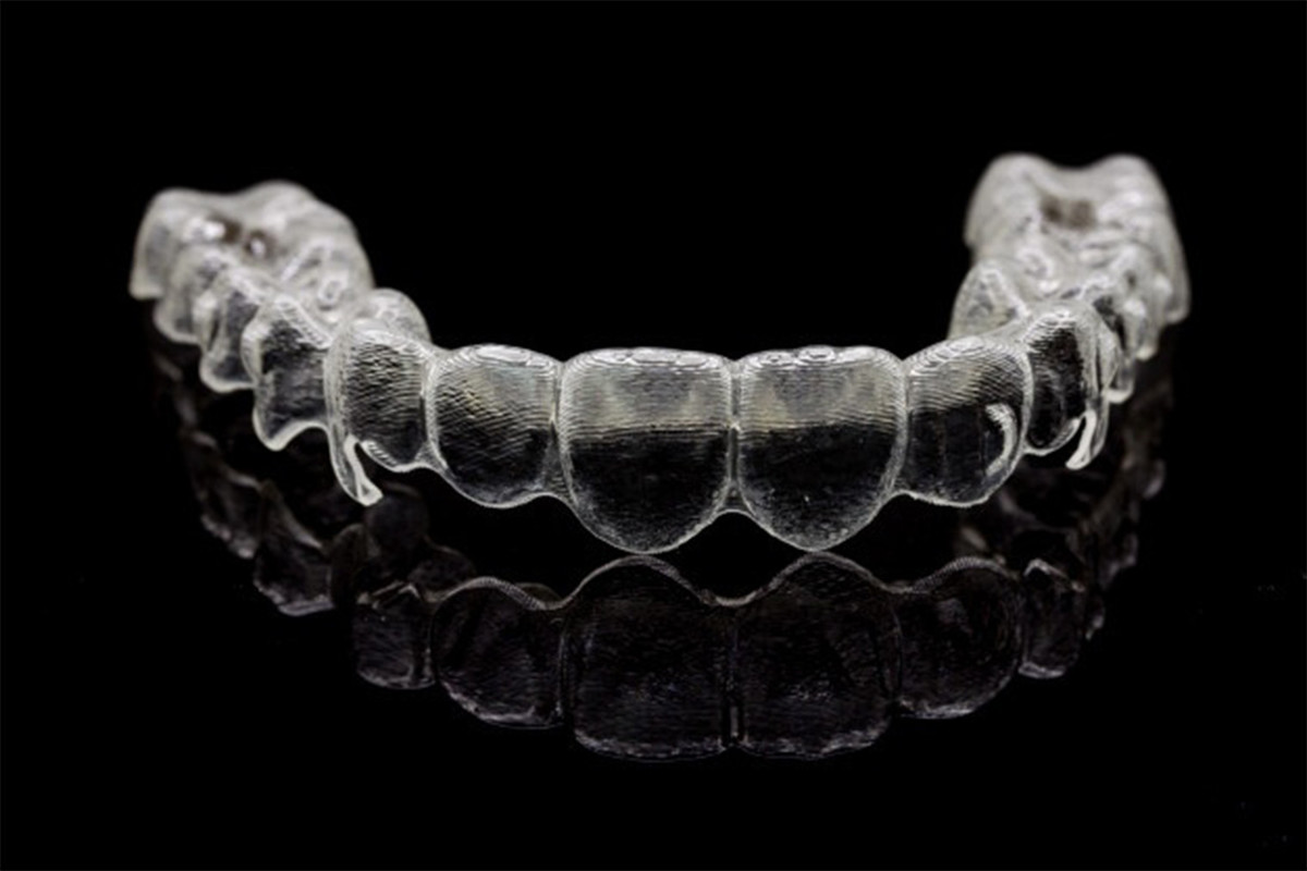 Orthodontc-appliances-service_1/invisalign-braces-invisible-retainer-black-background-2